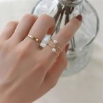 bague de mariage or perle de culture blanche