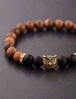 bijou en bois et onyx noir