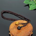 bijou homme perle noir