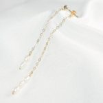 boucle d'oreille chic avec perle