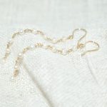 boucle d'oreille design moderne perle Sakura