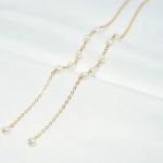 boucle d'oreille élégante avec perle