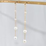 boucle d'oreille perle pendante akira