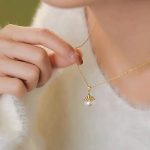 collier avec pendentif perle de culture blanche