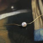collier élégant en or et perles