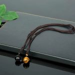 collier élégant perle noir pour homme