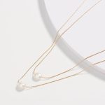 collier élégant perles en acier