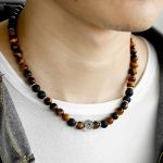 collier en lave et œil de tigre avec bracelet assorti
