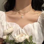 collier ras du cou en perles